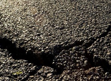 Signs That Your Commercial Asphalt Parking Lot Needs Repairs