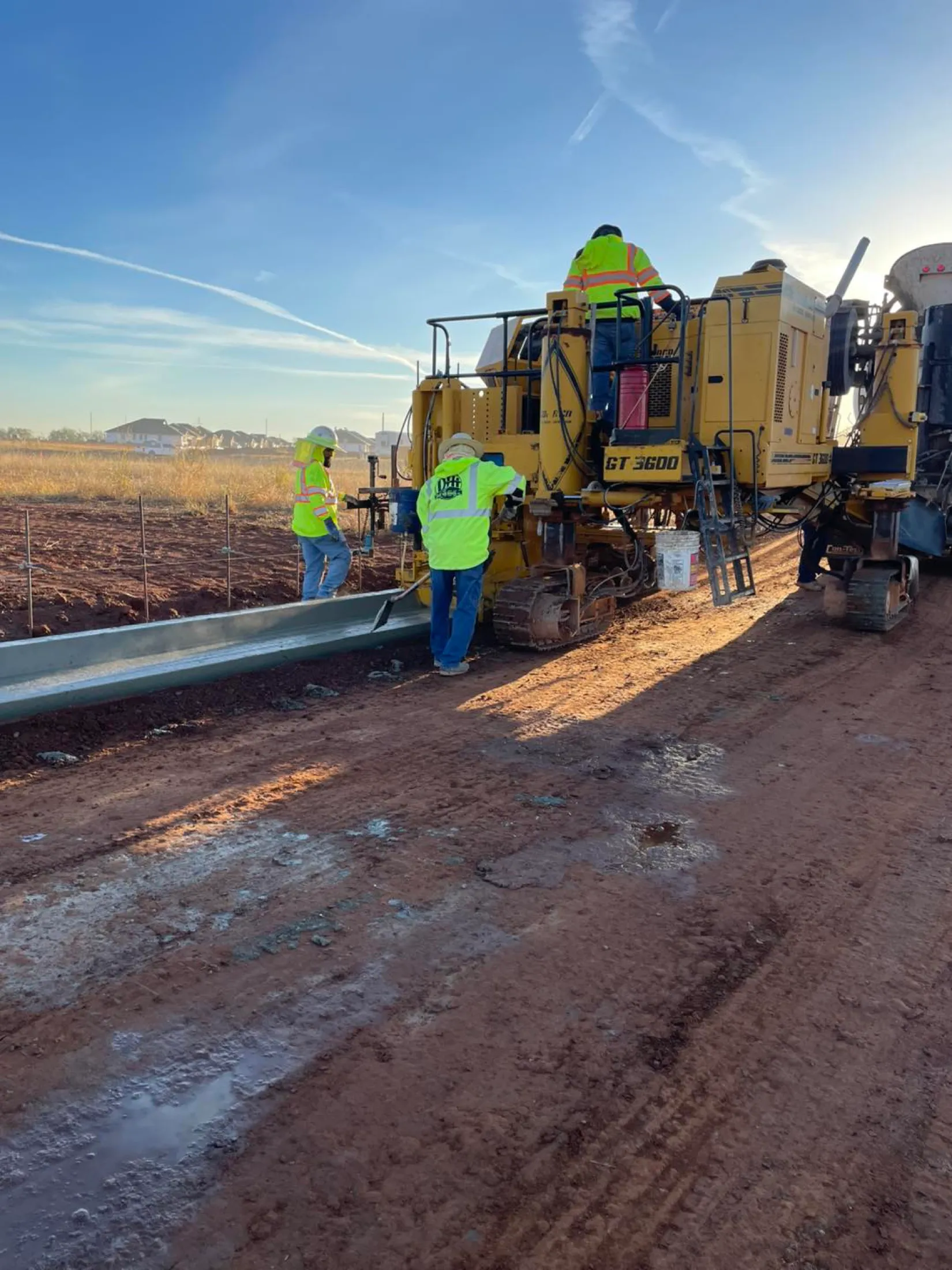 Barrier wall being slipformed on a First Water project