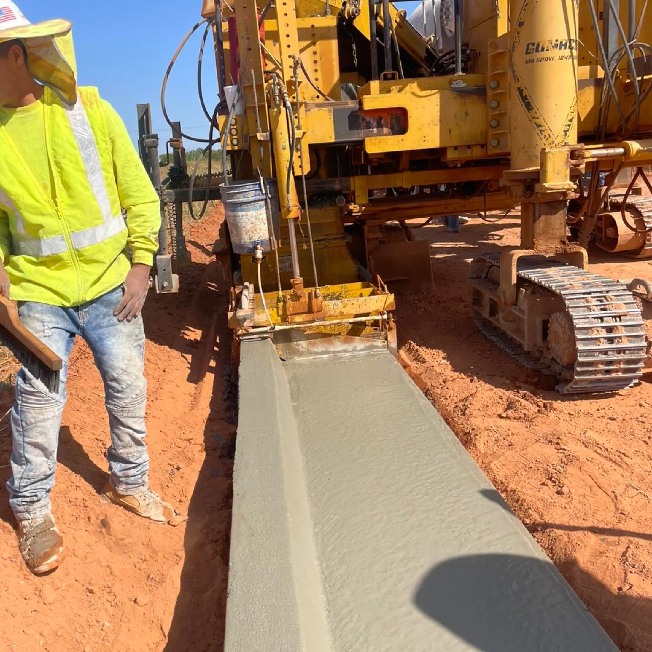 Fresh curb coming off the slipform paver