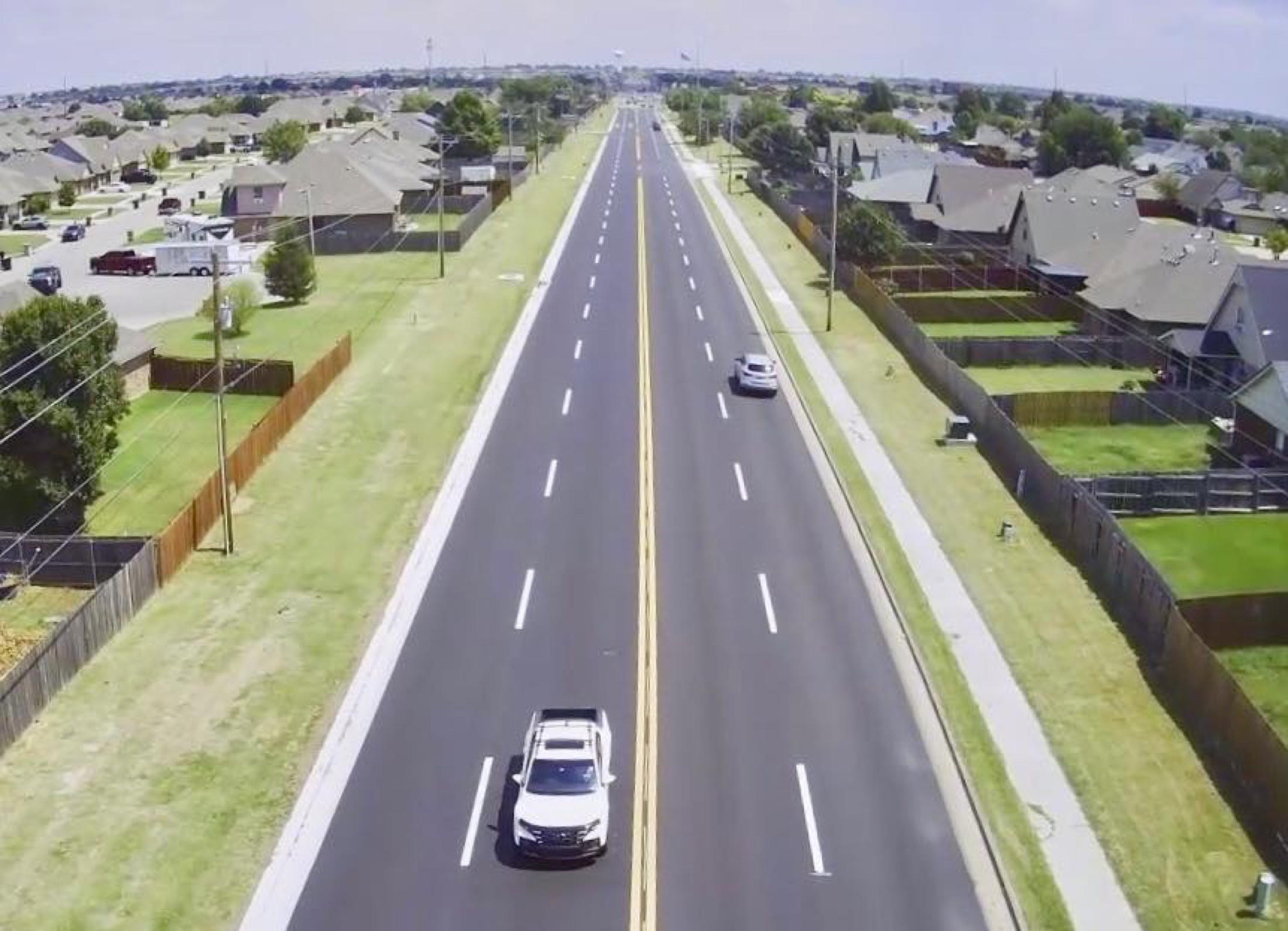 Aerial view of a finished four-lane roadway built by First Water