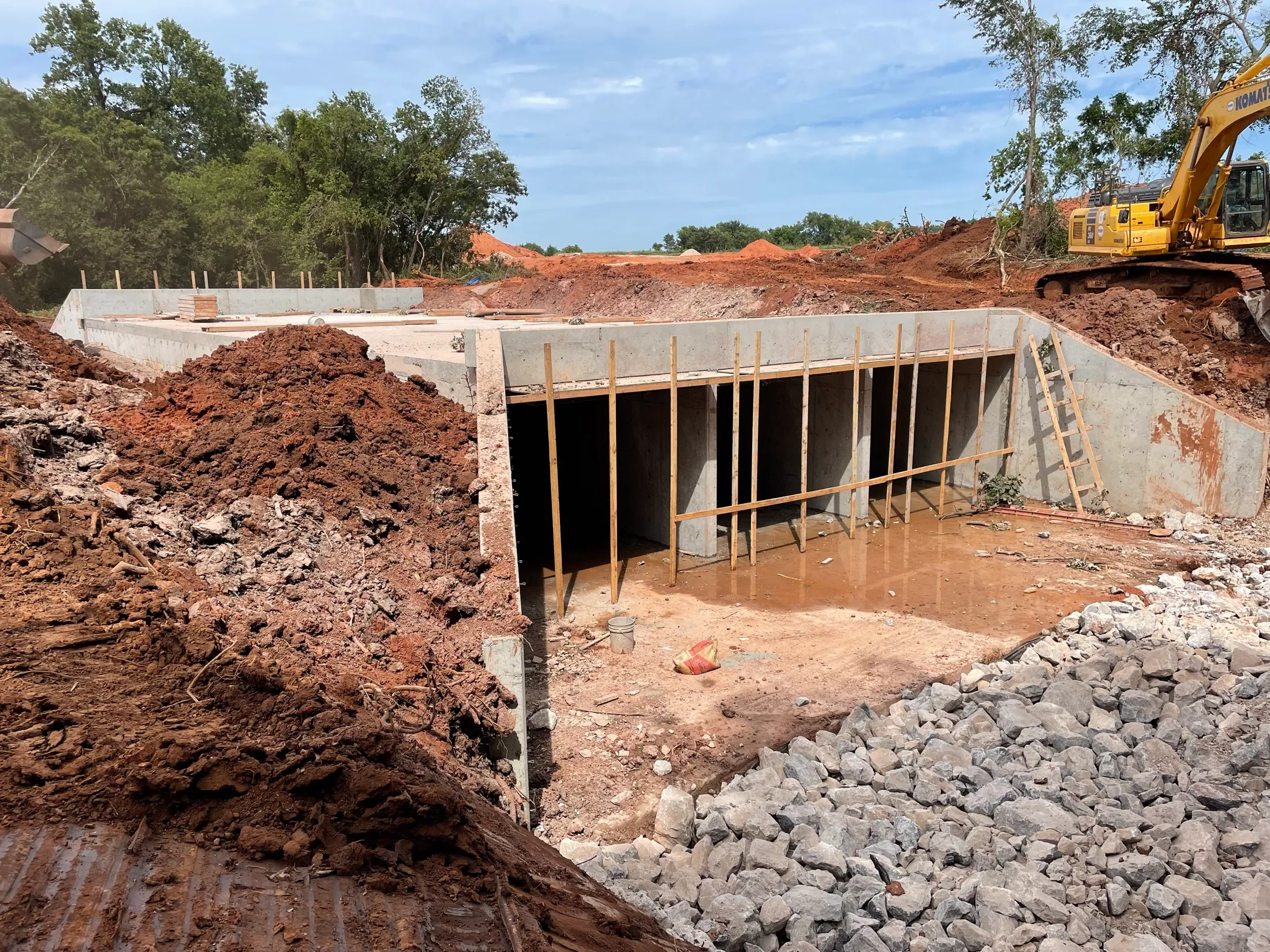 A First Water cast-in-place concrete box culvert with riprap, ready for backfill